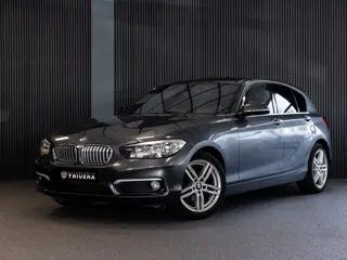 BMW 1-serie 118i Sport l AUT.l CAM.l NAV l CARPLAY l XENON l CLIMA l Dealer onderhouden