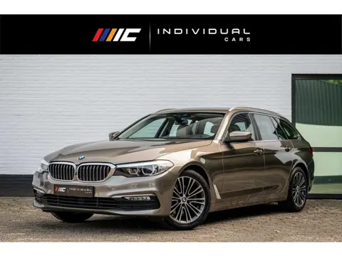 BMW 5-serie Touring 520i Executive Leder Trekhaak LED Orig NL Auto