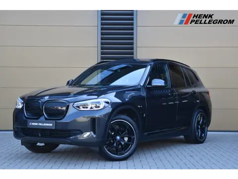 BMW iX3 High Executive 80 kWh * Head-up * Panoramadak * 20'lm * Harman/Kardon * Trekhaak * Keyless *
