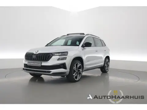 Škoda Karoq 1.5 TSI ACT Sportline Business | Pano | Adapt. Cruise | Navi | CarPlay | Stoel-Stuurverw