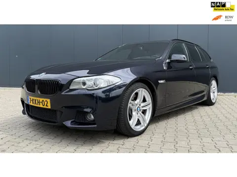 BMW 5-serie Touring 528i High Executive M Sport Airco Cruise Pano Luchtvering