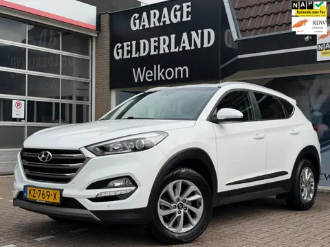 Hyundai Tucson 1.6 | Navi | Camera | Trekhaak | Stoelverw. | Climate | Cruise | Pdc | Isofix | Full-