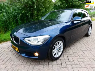 BMW 1-serie 116i 3-deurs 136pk 4-Cil. Airco Cruise Leder Navi Historie Geen import