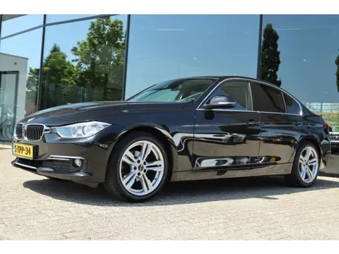 BMW 3-SERIE 316I HIGH EXECUTIVE AUT. | LEDER | NAVI | STOELVERW. | PDC | LMV