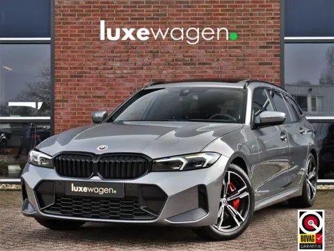 BMW 3 Serie Touring 320i M-Sport Pro Pano HUD HiFi Camera