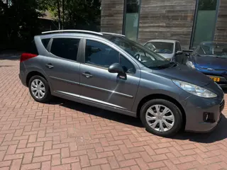Peugeot 207 SW RIJKAAR/APK/HISTORY/PANORAMADAK/TREKHAAK/NAP/AIRCO/5drs//DIREKT MEE