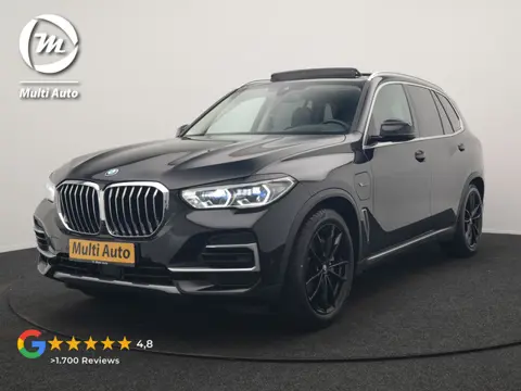 BMW X5 xDrive45e X Line PHEV 395pk Dealer O.H. | Trekhaak Af Fabriek | Panodak | Luchtvering | Head 
