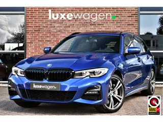 BMW 3 Serie Touring 330e xDrive M-Sport Pano Trekh El-zetels HUD Laser 19inch Adp-onderstel