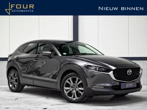 Mazda CX-30 2.0 e-SkyActiv-X M Hybrid Luxury | Trekhaak | BOSE | HUD | Topview | Winter | Nw banden 