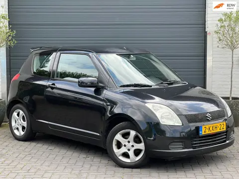 Suzuki Swift 1.3 | Airco | Zwart | 3-Drs | 2005 | 999,- |