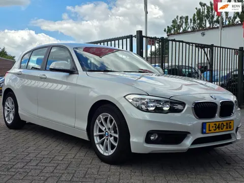 BMW 1-serie 118i Corporate Lease Executive Paramuur 1e eigenaar dealer onderhouden navigatie airco c