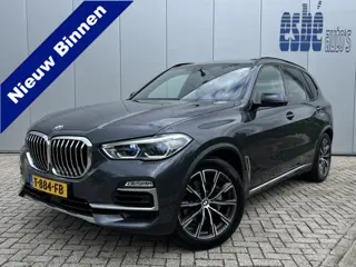 BMW X5 xDrive30d High Executive X-Line Luchtvering Individual Tartufo leder Trekhaak 3500 kg Panoram