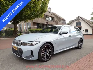 BMW 3 Serie Touring 320e / TREKHAAK / FACELIFT WIDESCREEN / CARPLAY / SPORTSTOELEN