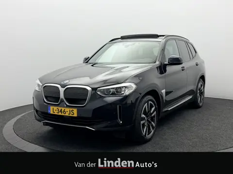 BMW iX3 Executive 80 kWh SOH 93,4% | Panoramadak | Trekhaak | Camera | Live Cockpit | Leer
