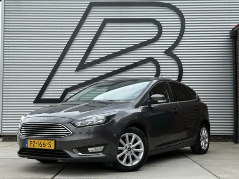 Ford Focus 1.0 Titanium Navi|Clima|Cruise|PDC V+A|Carplay|N.A.P|APK tot 01-2027