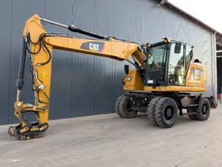 Cat M315F - With OilQuick (bj 2017)