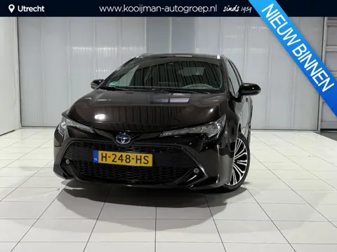 Toyota Corolla Touring Sports 2.0 Hybrid Business Plus | Leer | Trekhaak | All Season banden | Deale