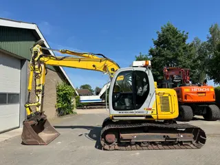 New Holland E115SR-1ES (bj 2005)