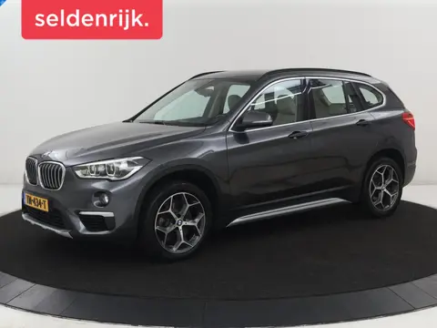 BMW X1 sDrive20i Orange Edition II | Leder | Trekhaak | Head-up | Park assist | Sfeerverlichting | S
