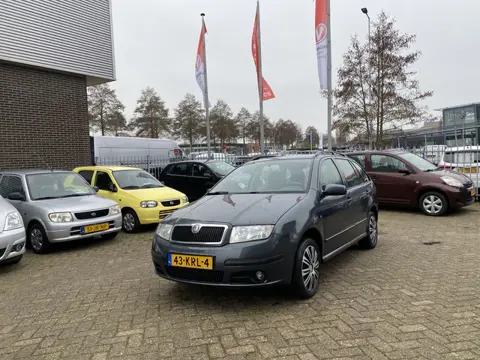 Škoda Fabia Combi 1.2-12V Ambiente,Airco,Cruisecontrol,Bleutooth,Trekhaak,Elektrischpakket,Achteruit