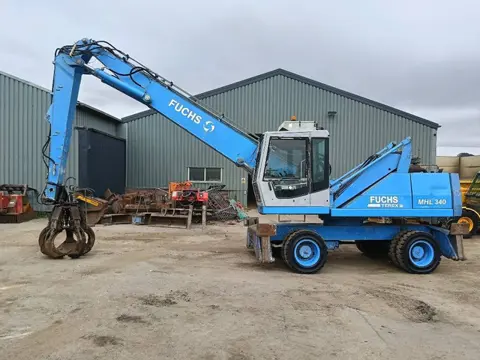 Fuchs MHL 340 waste industry handler umslagbagger