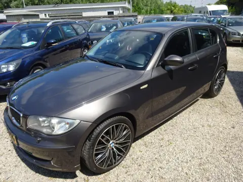 BMW 1-serie 116i airco navigatie 6 bak schuifdak