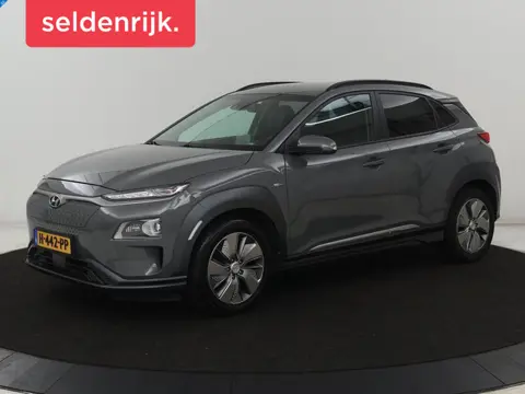 Hyundai Kona EV Premium 64 kWh | SOH 100% | 3 Fase |  Stoelventilatie | Leder | Head-Up | Warmtepomp