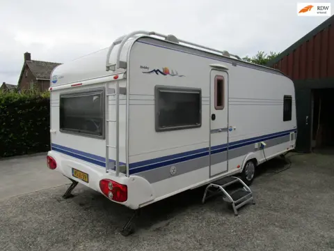 Hobby 24 560 lang breed 250 airco mover voortent tv compleet