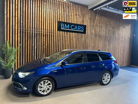Toyota Auris Touring Sports 1.8 Hybrid Lease pro Panodak,Camera,Half leer