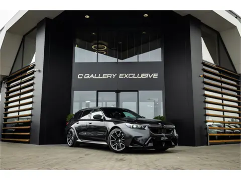 BMW 5 Serie Touring M5 - Panorama | B&W | Carbon | Elek. Trekhaak | 360 Camera