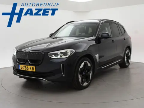 BMW iX3 HIGH EXECUTIVE 80 kWh + TREKHAAK | PANORAMA | 360 CAMERA | ADAPTIVE CRUISE | SFEERVERLICHTIN