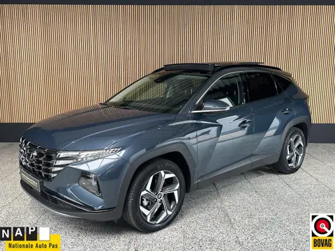 Hyundai Tucson 1.6 T-GDI PHEV Comfort Smart 4WD Trekhaak | Schuif / kantel dak | Camera,