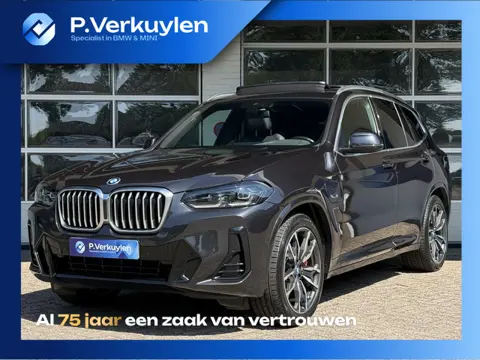 BMW X3 xDrive30e M SPORT | SPORTREMMEN ROOD | PANORAMA | TREKHAAK | ADAPTIEF ONDERSTEL | CAMERA | KE