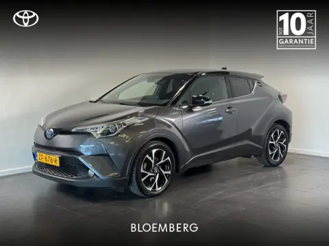 Toyota C-HR 1.8 Hybrid Style | Trekhaak | JBL Audio | Dodehoekdetectie | Stoelverwarming | tom t/m 1