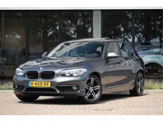 BMW 1-serie 118i | Schuif/Kanteldak | Navi | Trekhaak | Stoelverw. | PDC | Clima | Cruise