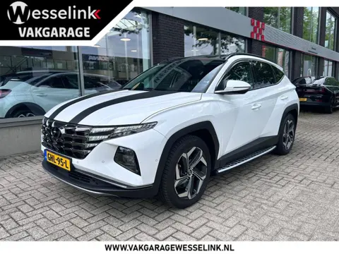 Hyundai Tucson 1.6 T-GDI PHEV Premium Sky 4WD | Panorama | Leder | All Season banden |