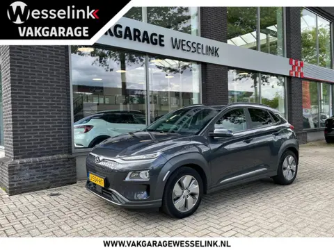 Hyundai Kona EV Premium 64 kWh | SOH 100% | Stoelverw. + ventilatie | Prem. audio | Adpt. cruise