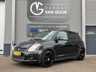 Suzuki Swift 1.3 Limited 93PK Trekhaak,Airco,Cruise,ElektrRamen+Spiegels,StoelVerwarming,Isofix,Mult