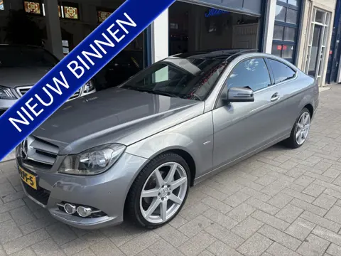 Mercedes-Benz C-Klasse Coupé 180 NL AUTO/PANORAMA/LEDER