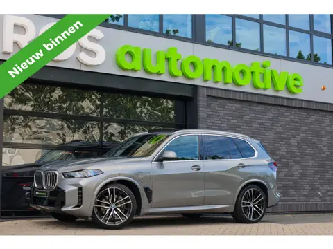 BMW X5 xDrive50e | BTW | SKYLOUNGE | 22 INCH | COMFORTSTOELEN | H/K | ACC | HUD |