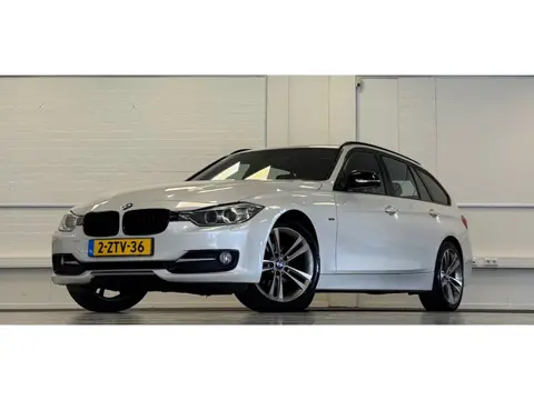 BMW 3-serie Touring 316d High Executive Lerenbekleding Trekhaak Elek. klep Xenon LED