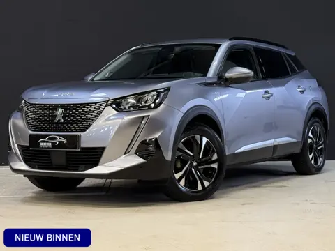 Peugeot e-2008 EV Allure 50 kWh | SOH 99% | Draadloze lader | Stoelverwarming | Dealeronderhouden