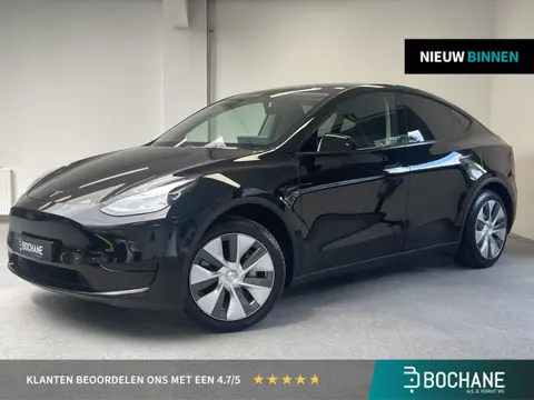 Tesla Model Y RWD 58 kWh | TREKHAAK | ORG.NL |