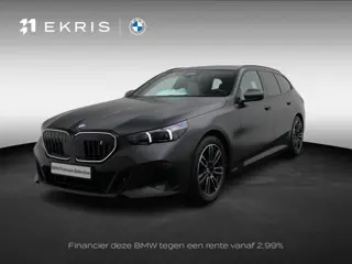 BMW i5 Touring eDrive40 M Sportpakket Pro | SoH 100% | Achteruitrijcamera | Driving Assistant Plus |