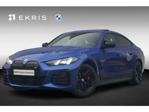 BMW i4 Gran Coupé eDrive40 M Sportpakket Pro | Schuif-/kanteldak | Active Cruise Control | Verwarmde