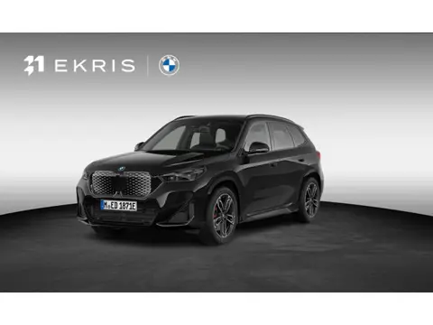 BMW iX1 eDrive20 67 kWh | SoH 100% | M-Sport Pro | Adaptive Cruise | Trekhaak | Harman Kardon | Pano