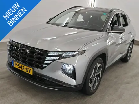 HYUNDAI TUCSON 1.6 T-GDI PHEV PREMIUM 4WD (100% SOH) I TREKHAAK 1350KG I STOELVERWARMING I APPLE CAR