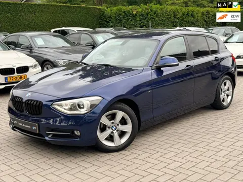 BMW 1-serie 114i EDE Corporate Lease Edition|Distributie ketting verv.|Groot Navi|Xenon|Climate cont