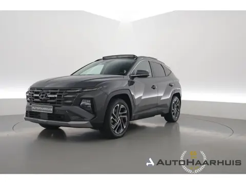 Hyundai Tucson 1.6 T-GDI PHEV Premium 4WD | Rijklaar! | Facelift | S/K-Dak | Widescreen | HUD | Memo