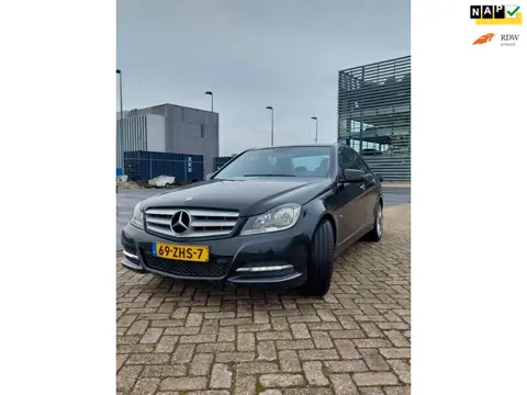 Mercedes-Benz C-klasse 180 LEER/1e EIGENAAR/RIJDT NIEUW/PDC!